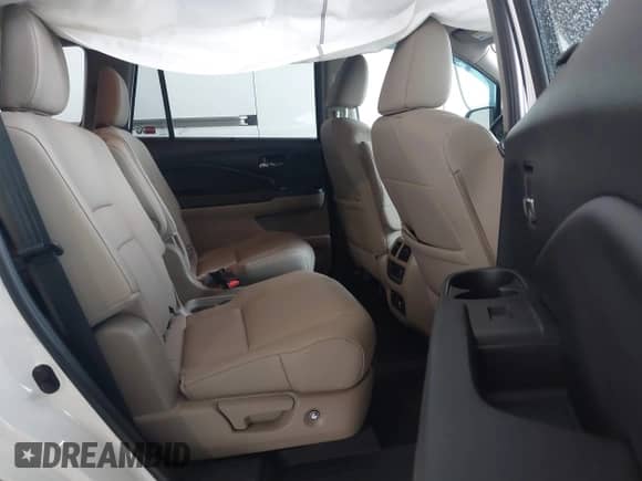 2020 Honda Pilot Touring 7-Passenger z VIN 5FNYF5H60LB026398, wystawiony jako IAAI lot #41294517 z przebiegiem 52 917 mil mil oraz . Historia ofert i sprzedaży dostępna na DreamBid. Obrazek 8.