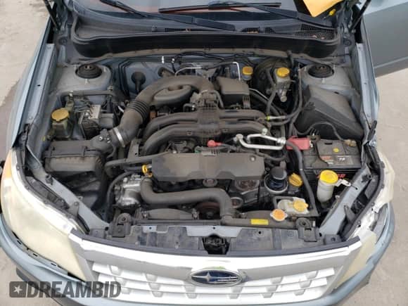 2012 Subaru Forester X Premium z VIN JF2SHBDC4CG444612, wystawiony jako Copart lot #49809885 z przebiegiem 109 953 mil mil oraz Szkoda całkowita • Salvage title. Historia ofert i sprzedaży dostępna na DreamBid. Obrazek 13.