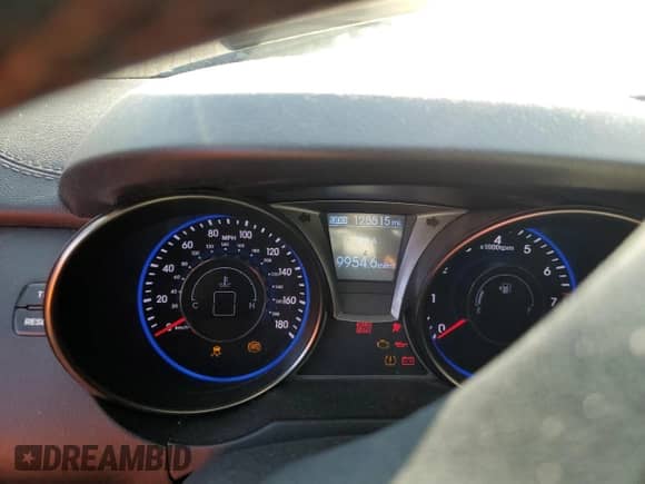 2013 Hyundai Genesis Coupe R-Spec with VIN KMHHU6KJ4DU097407, listed as a Copart auction lot 70995454 with 128,815 mi miles and Salvage title. Bid and sale history available at DreamBid. Image 9.