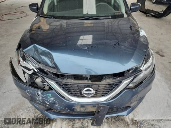 2017 Nissan Sentra SR with VIN 3N1AB7AP5HY369945, listed as a Copart auction lot 70814105 with 57,679 mi miles and Salvage title. Bid and sale history available at DreamBid. Image 11.