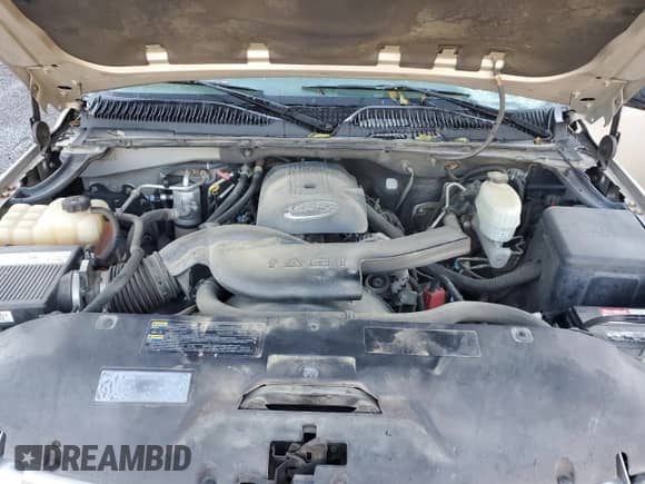 2004 Chevrolet Tahoe LS with VIN 1GNEC13Z84R250995, listed as a Copart auction lot 70758215 with 205,024 mi miles and Salvage title. Bid and sale history available at DreamBid. Image 12.