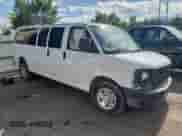 2013 Chevrolet Express Passenger 1LS с VIN 1GAZGZFA6D1120434, выставлен на аукционе Copart как лот 60413545 с пробегом Не указан миль и Списание • Salvage title. История ставок и продаж доступна на DreamBid. Изображение 4.