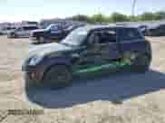 2018 MINI Hardtop Cooper with VIN WMWXP5C54J2G64015, listed as a Copart auction lot 61866865 with 32,927 mi miles and Salvage title. Bid and sale history available at DreamBid. Image 1.