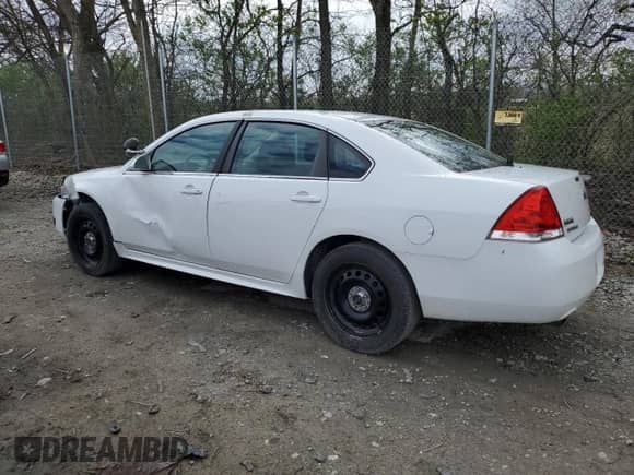 2014 Chevrolet Impala Police Police with VIN 2G1WD5E30E1185993, listed as a Copart auction lot 52155985 with 96,754 mi miles and Salvage title. Bid and sale history available at DreamBid. Image 2.