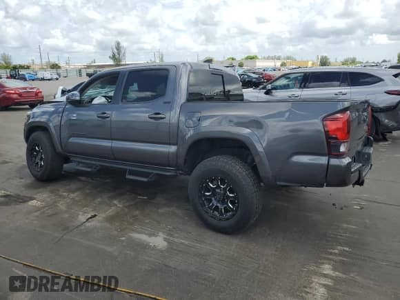 2022 Toyota Tacoma SR5 with VIN 3TYAZ5CNXNT016472, listed as a Copart auction lot 64419425 with 45,643 mi miles and Salvage title. Bid and sale history available at DreamBid. Image 2.