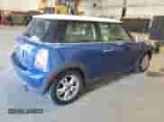 2013 MINI Hardtop with VIN WMWSU3C54DT686969, listed as a Copart auction lot 62160145 with 100,636 mi miles and Clean title. Bid and sale history available at DreamBid. Image 3.