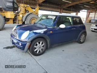 2004 MINI Hardtop with VIN WMWRC33464TJ55121, listed as a Copart auction lot 80128955 with 133,166 mi miles and Salvage title. Bid and sale history available at DreamBid. Image 1.