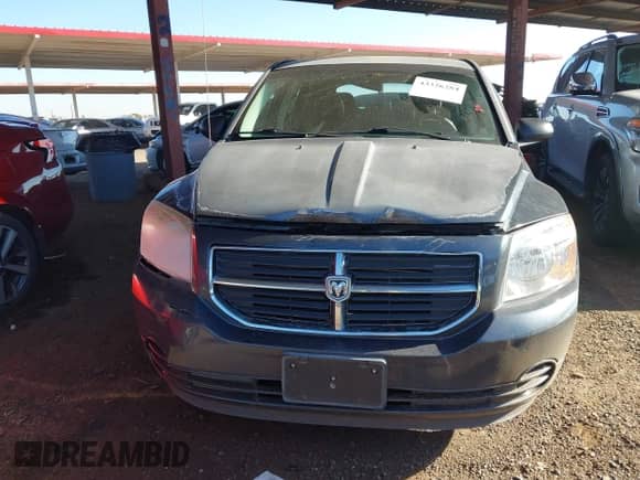2007 Dodge Caliber SXT with VIN 1B3HB48B47D340900, listed as a IAAI auction lot 43326284 with 77,817 mi miles and . Bid and sale history available at DreamBid. Image 6.
