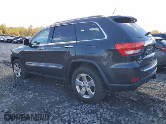 2012 Jeep Grand Cherokee Limited z VIN 1C4RJFBG3CC315296, wystawiony jako Copart lot #86295685 z przebiegiem 80 637 mil mil oraz Szkoda całkowita • Salvage title. Historia ofert i sprzedaży dostępna na DreamBid. Obrazek 2.