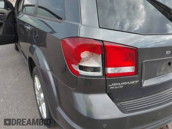 2014 Dodge Journey SXT with VIN 3C4PDDBG3ET190729, listed as a IAAI auction lot 43362931 with 198,369 mi miles and . Bid and sale history available at DreamBid. Image 6.