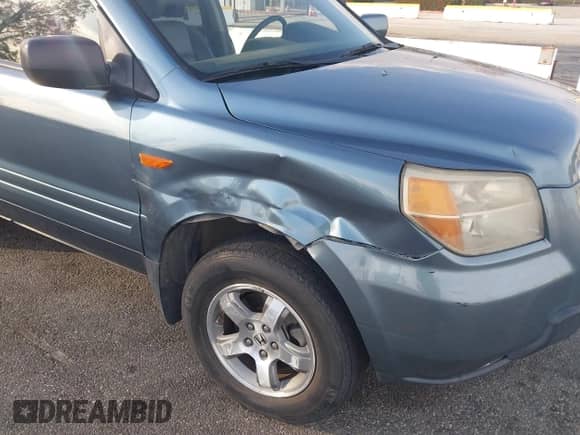 2006 Honda Pilot EX-L z VIN 5FNYF28706B035145, wystawiony jako IAAI lot #41608774 z przebiegiem 96 638 mil mil oraz . Historia ofert i sprzedaży dostępna na DreamBid. Obrazek 6.