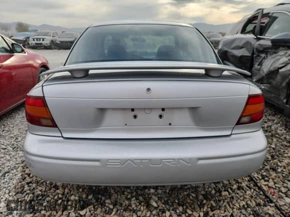 2000 Saturn SL with VIN 1G8ZH5284YZ240606, listed as a Copart auction lot 80808315 with 206,722 mi miles and Salvage title. Bid and sale history available at DreamBid. Image 6.