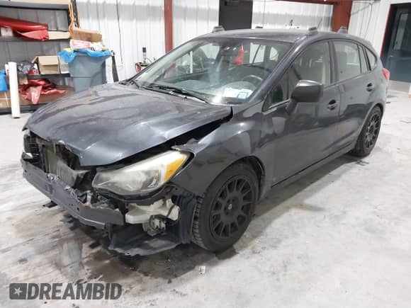 2013 Subaru Impreza 2.0i with VIN JF1GPAA60DG863418, listed as a IAAI auction lot 41319335 with 150,042 mi miles and . Bid and sale history available at DreamBid. Image 2.