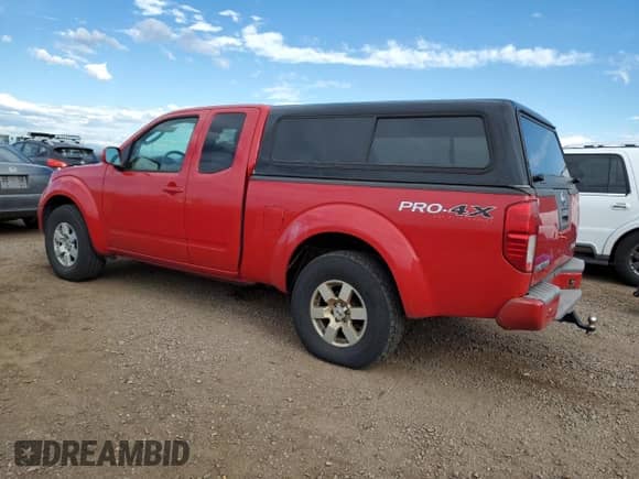 2011 Nissan Frontier Pro-4X with VIN 1N6AD0CWXBC406603, listed as a Copart auction lot 81475145 with 164,797 mi miles and Salvage title. Bid and sale history available at DreamBid. Image 2.