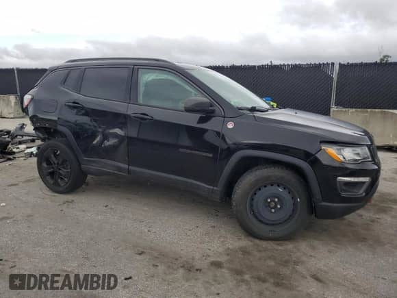 2018 Jeep Compass Trailhawk с VIN 3C4NJDDB8JT129520, выставлен на аукционе Copart как лот 85533585 с пробегом 83 213 миль миль и Списание • Salvage title. История ставок и продаж доступна на DreamBid. Изображение 4.