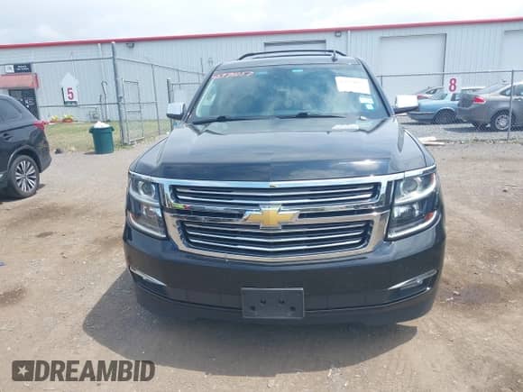 2018 Chevrolet Tahoe Premier with VIN 1GNSKCKC8JR104865, listed as a IAAI auction lot 42771057 with 123,387 mi miles and . Bid and sale history available at DreamBid. Image 12.