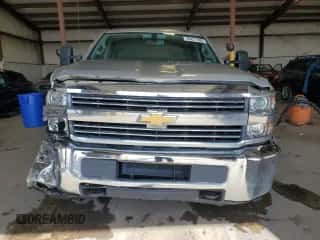 2016 Chevrolet Silverado 2500HD Work Truck z VIN 1GC1KUEG1GF258482, wystawiony jako Copart lot #84871485 z przebiegiem 198 861 mil mil oraz Szkoda całkowita • Salvage title. Historia ofert i sprzedaży dostępna na DreamBid. Obrazek 5.
