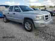 2010 Dodge Dakota Bighorn/Lonestar z VIN 1D7CE3GK2AS200512, wystawiony jako Copart lot #72061585 z przebiegiem 146 303 mil mil oraz Szkoda całkowita • Salvage title. Historia ofert i sprzedaży dostępna na DreamBid. Obrazek 4.