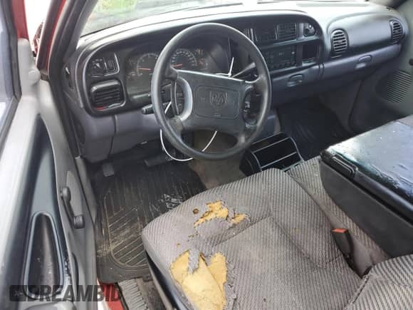 2000 Dodge 1500 z VIN 3B7HC12Z6YG127399, wystawiony jako Copart lot #72203464 z przebiegiem 177 592 mil mil oraz Szkoda całkowita • Salvage title. Historia ofert i sprzedaży dostępna na DreamBid. Obrazek 8.