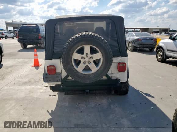 2001 Jeep Wrangler Sport с VIN 1J4FA49S01P305620, выставлен на аукционе Copart как лот 85516025 с пробегом Не указан миль и Списание • Salvage title. История ставок и продаж доступна на DreamBid. Изображение 6.