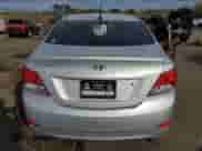 2014 Hyundai Accent GLS z VIN KMHCT4AE5EU703823, wystawiony jako Copart lot #86420595 z przebiegiem 132 910 mil mil oraz Szkoda całkowita • Salvage title. Historia ofert i sprzedaży dostępna na DreamBid. Obrazek 6.