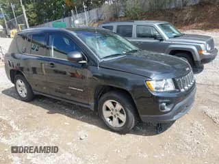 2014 Jeep Compass Sport z VIN 1C4NJCBA9ED511443, wystawiony jako IAAI lot #43319485 z przebiegiem 107 763 mil mil oraz . Historia ofert i sprzedaży dostępna na DreamBid. Obrazek 1.