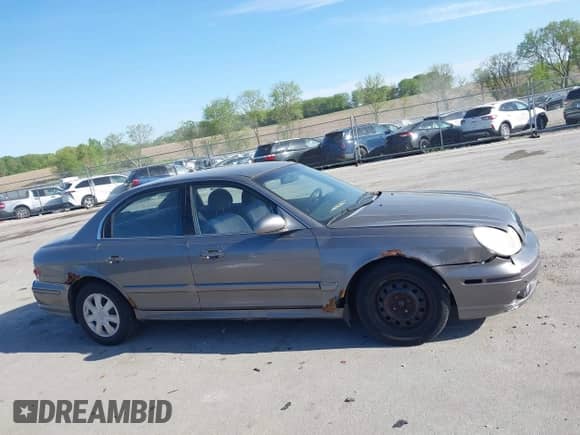 2003 Hyundai Sonata with VIN KMHWF25S03A877600, listed as a IAAI auction lot 42247620 with 85,392 mi miles and . Bid and sale history available at DreamBid. Image 14.