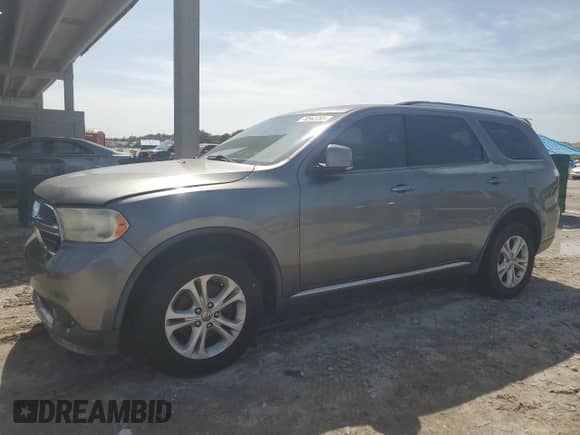 2012 Dodge Durango Crew z VIN 1C4RDHDG3CC330283, wystawiony jako Copart lot #70563285 z przebiegiem 174 251 mil mil oraz Czysty tytuł • Clean title. Historia ofert i sprzedaży dostępna na DreamBid. Obrazek 1.