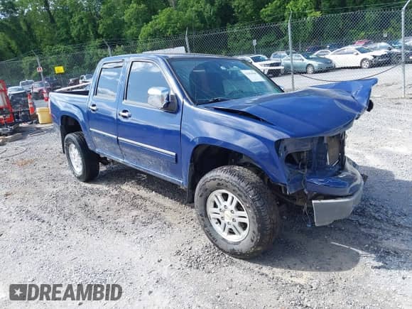 2011 Chevrolet Colorado 1LT z VIN 1GCHTCFE5B8124302, wystawiony jako IAAI lot #42494908 z przebiegiem 121 194 mil mil oraz . Historia ofert i sprzedaży dostępna na DreamBid. Obrazek 1.