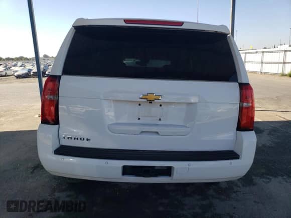 2015 Chevrolet Tahoe LT with VIN 1GNSKBKC2FR182883, listed as a Copart auction lot 70604715 with Not provided miles and Salvage title. Bid and sale history available at DreamBid. Image 6.