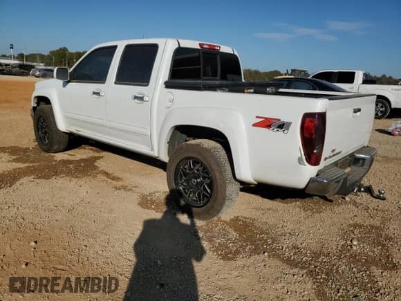 2012 Chevrolet Colorado 2LT with VIN 1GCHTDFP5C8108481, listed as a Copart auction lot 77945234 with 104,997 mi miles and Salvage title. Bid and sale history available at DreamBid. Image 2.