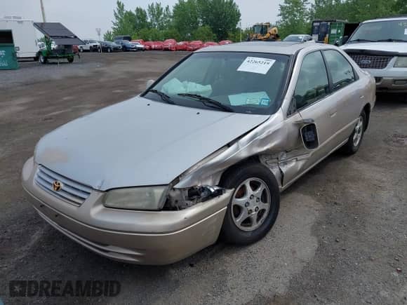 1998 Toyota Camry LE with VIN 4T1BG28K6WU284513, listed as a IAAI auction lot 42265219 with 90,892 mi miles and . Bid and sale history available at DreamBid. Image 6.