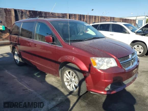 2018 Dodge Grand Caravan SXT with VIN 2C4RDGCG1JR297512, listed as a Copart auction lot 84973275 with 76,009 mi miles and Salvage title. Bid and sale history available at DreamBid. Image 4.