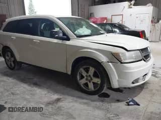 2009 Dodge Journey SXT with VIN 3D4GH57V29T593160, listed as a IAAI auction lot 43387864 with 122,911 mi miles and . Bid and sale history available at DreamBid. Image 1.