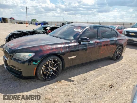 2013 BMW 7 Series 750Li with VIN WBAYE8C51DD133565, listed as a Copart auction lot 69298155 with 107,865 mi miles and Salvage title. Bid and sale history available at DreamBid. Image 1.