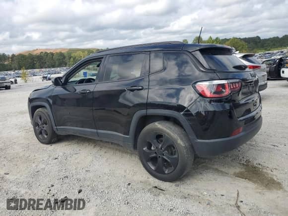 2019 Jeep Compass Altitude with VIN 3C4NJCBB5KT676730, listed as a Copart auction lot 85666565 with 123,853 mi miles and Clean title. Bid and sale history available at DreamBid. Image 2.