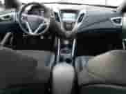 2016 Hyundai Veloster с VIN KMHTC6AD0GU298346, выставлен на аукционе Copart как лот 81289574 с пробегом 87 540 миль миль и Списание • Salvage title. История ставок и продаж доступна на DreamBid. Изображение 8.