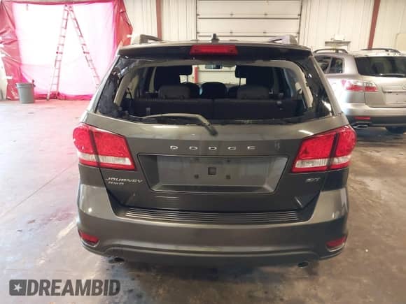 2015 Dodge Journey SXT with VIN 3C4PDDBG3FT596818, listed as a IAAI auction lot 42722530 with 148,968 mi miles and . Bid and sale history available at DreamBid. Image 17.