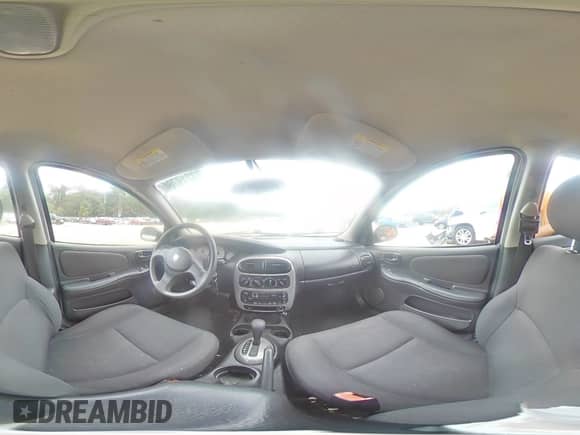 2004 Dodge Neon SXT with VIN 1B3ES56C54D628554, listed as a Copart auction lot 73219764 with 67,373 mi miles and Salvage title. Bid and sale history available at DreamBid. Image 13.
