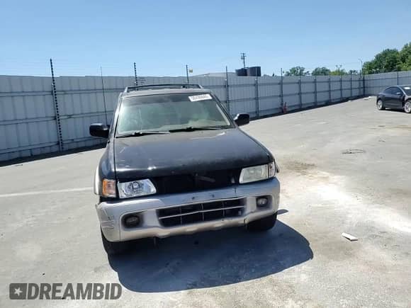 2001 Honda Passport LX with VIN 4S6DM58W714408214, listed as a Copart auction lot 56499845 with 258,772 mi miles and Salvage title. Bid and sale history available at DreamBid. Image 14.