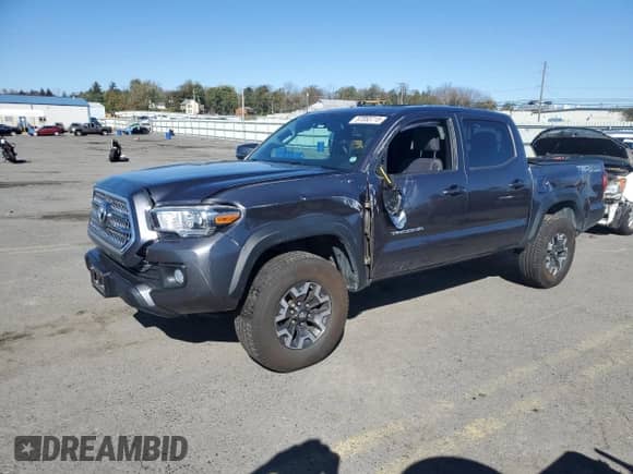 2016 Toyota Tacoma TRD Off Road with VIN 3TMCZ5AN2GM006271, listed as a Copart auction lot 87053715 with 92,101 mi miles and Salvage title. Bid and sale history available at DreamBid. Image 1.
