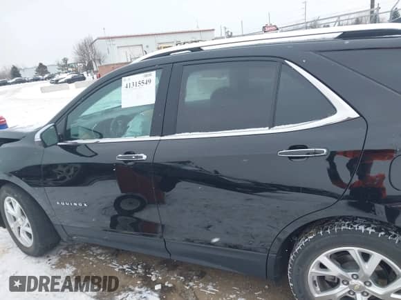 2021 Chevrolet Equinox Premier with VIN 2GNAXNEV9M6150369, listed as a IAAI auction lot 41315549 with 57,614 mi miles and . Bid and sale history available at DreamBid. Image 14.