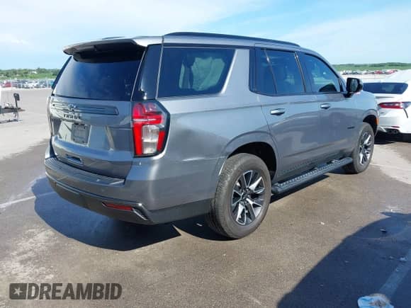 2021 Chevrolet Tahoe Z71 with VIN 1GNSKPKDXMR454793, listed as a IAAI auction lot 42688179 with 45,454 mi miles and . Bid and sale history available at DreamBid. Image 4.