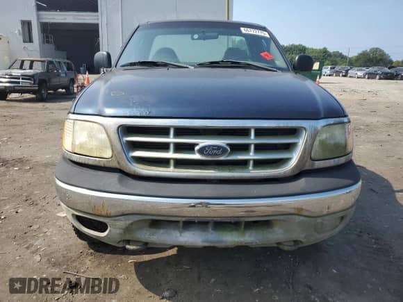 2003 Ford F-150 XL z VIN 2FTRF18263CA33194, wystawiony jako Copart lot #66772775 z przebiegiem Nie podano mil oraz Czysty tytuł • Clean title. Historia ofert i sprzedaży dostępna na DreamBid. Obrazek 5.