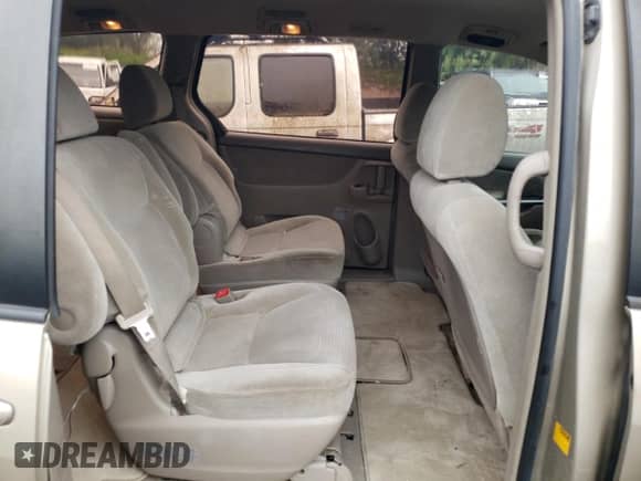 2010 Toyota Sienna CE z VIN 5TDKK4CCXAS337354, wystawiony jako Copart lot #80162185 z przebiegiem 352 738 mil mil oraz Szkoda całkowita • Salvage title. Historia ofert i sprzedaży dostępna na DreamBid. Obrazek 11.