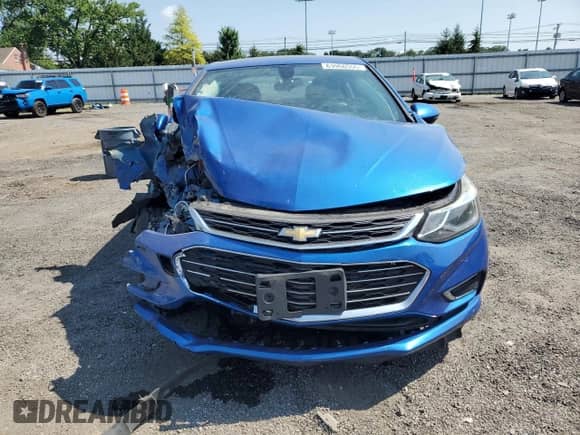 2017 Chevrolet Cruze Premier z VIN 1G1BF5SM1H7168844, wystawiony jako Copart lot #63966555 z przebiegiem 138 445 mil mil oraz Szkoda całkowita • Salvage title. Historia ofert i sprzedaży dostępna na DreamBid. Obrazek 5.