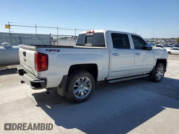 2017 Chevrolet Silverado 1500 High Country с VIN 3GCUKTEJXHG216945, выставлен на аукционе Copart как лот 85794395 с пробегом 129 032 миль миль и Списание • Salvage title. История ставок и продаж доступна на DreamBid. Изображение 3.