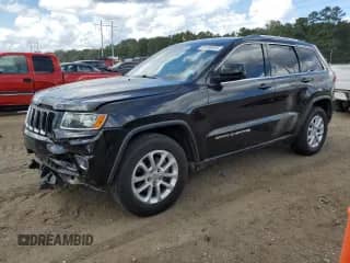2014 Jeep Grand Cherokee Laredo with VIN 1C4RJEAG4EC207784, listed as a Copart auction lot 81490235 with 165,048 mi miles and Salvage title. Bid and sale history available at DreamBid. Image 1.