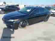 2022 Toyota Camry Hybrid XSE z VIN 4T1K31AK4NU579480, wystawiony jako IAAI lot #41709133 z przebiegiem 66 968 mil mil oraz . Historia ofert i sprzedaży dostępna na DreamBid. Obrazek 20.