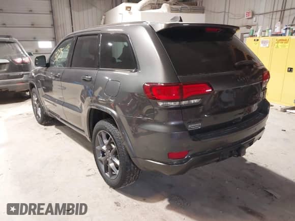 2021 Jeep Grand Cherokee Limited z VIN 1C4RJFBG0MC586852, wystawiony jako IAAI lot #41953875 z przebiegiem 89 029 mil mil oraz . Historia ofert i sprzedaży dostępna na DreamBid. Obrazek 3.